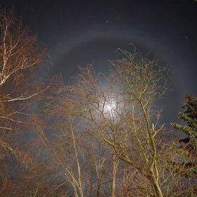 Moon's halo due to refraction of light from ice crystals