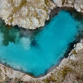 An azure heart over Italian Alps