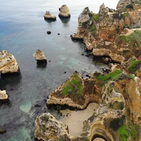 Rugged golden cliffs staring at a calmed ocean