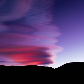 Stacked Lenticular Clouds at Twilight