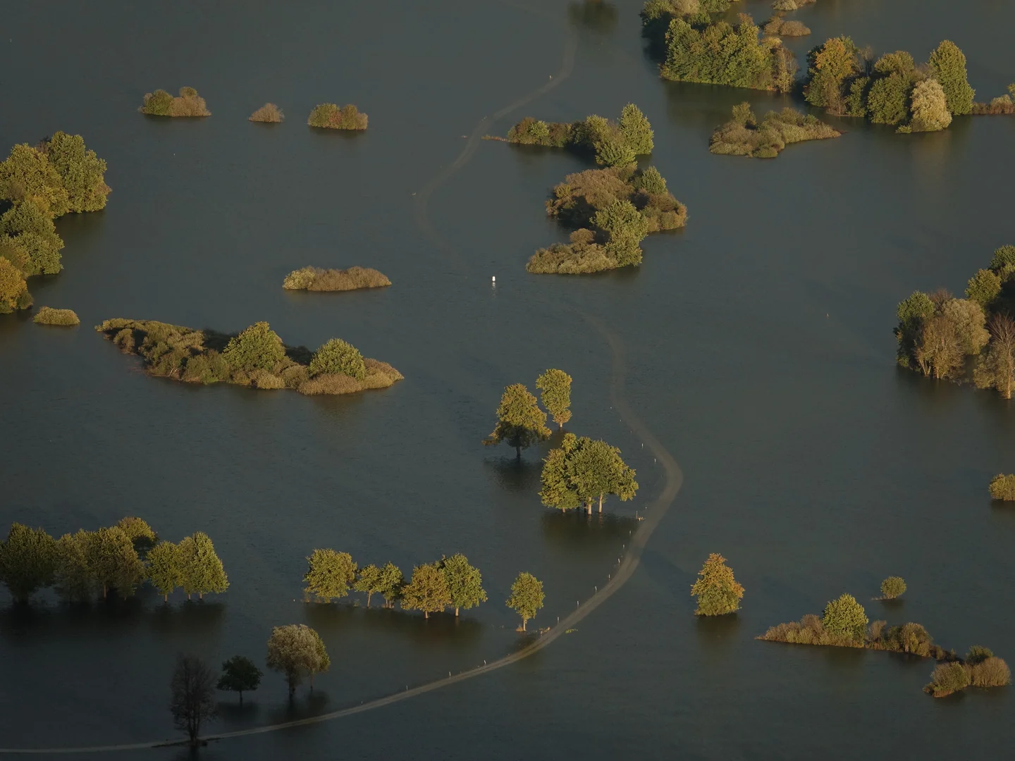 The trail that leads to nowhere - Sunset on flooded Planinsko Polje, Slovenia