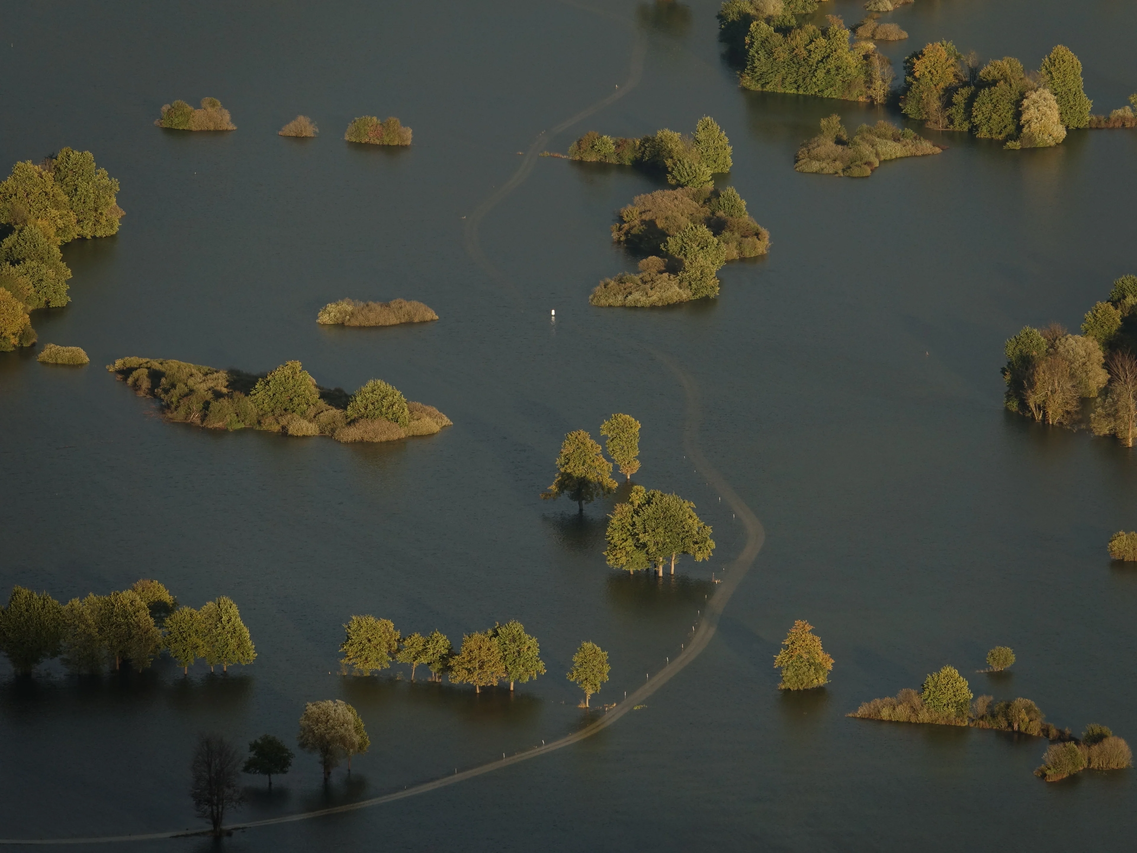 The trail that leads to nowhere - Sunset on flooded Planinsko Polje, Slovenia