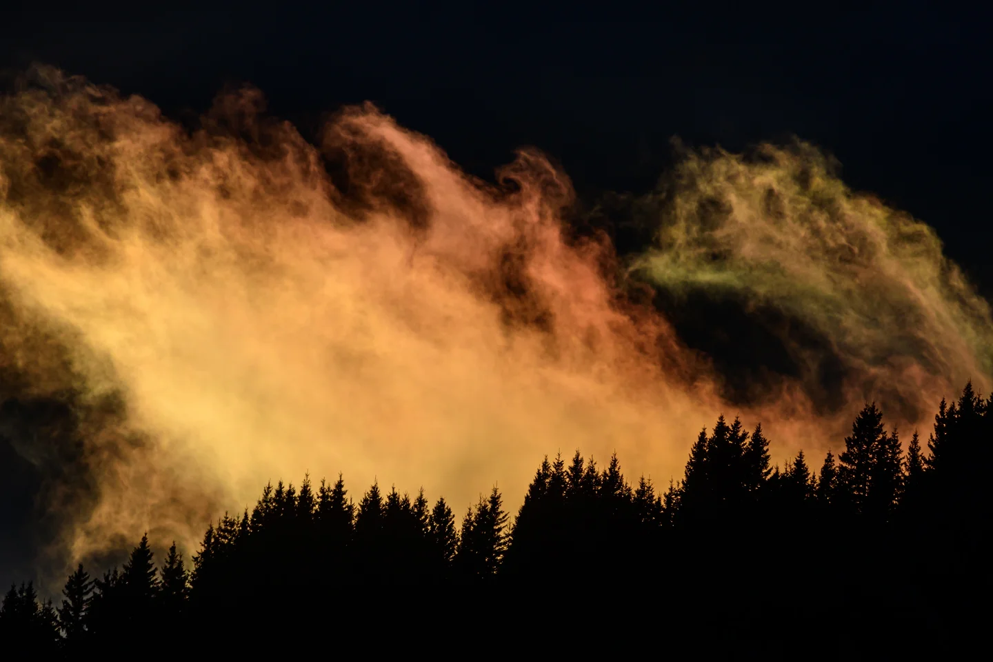 Clouds in the alps at sunset