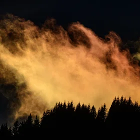Clouds in the alps at sunset