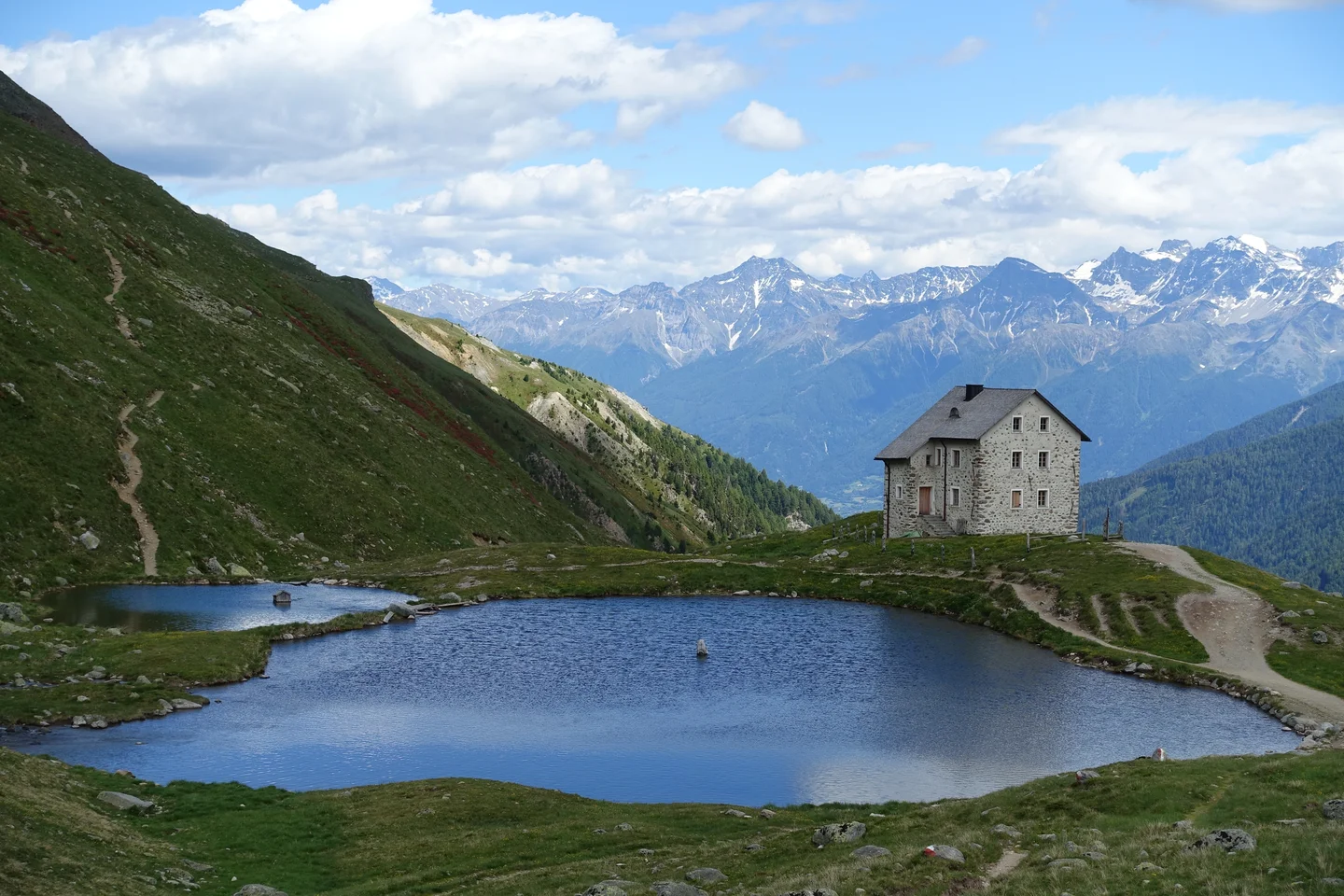 Small alpine water reservoir in Northern Italy