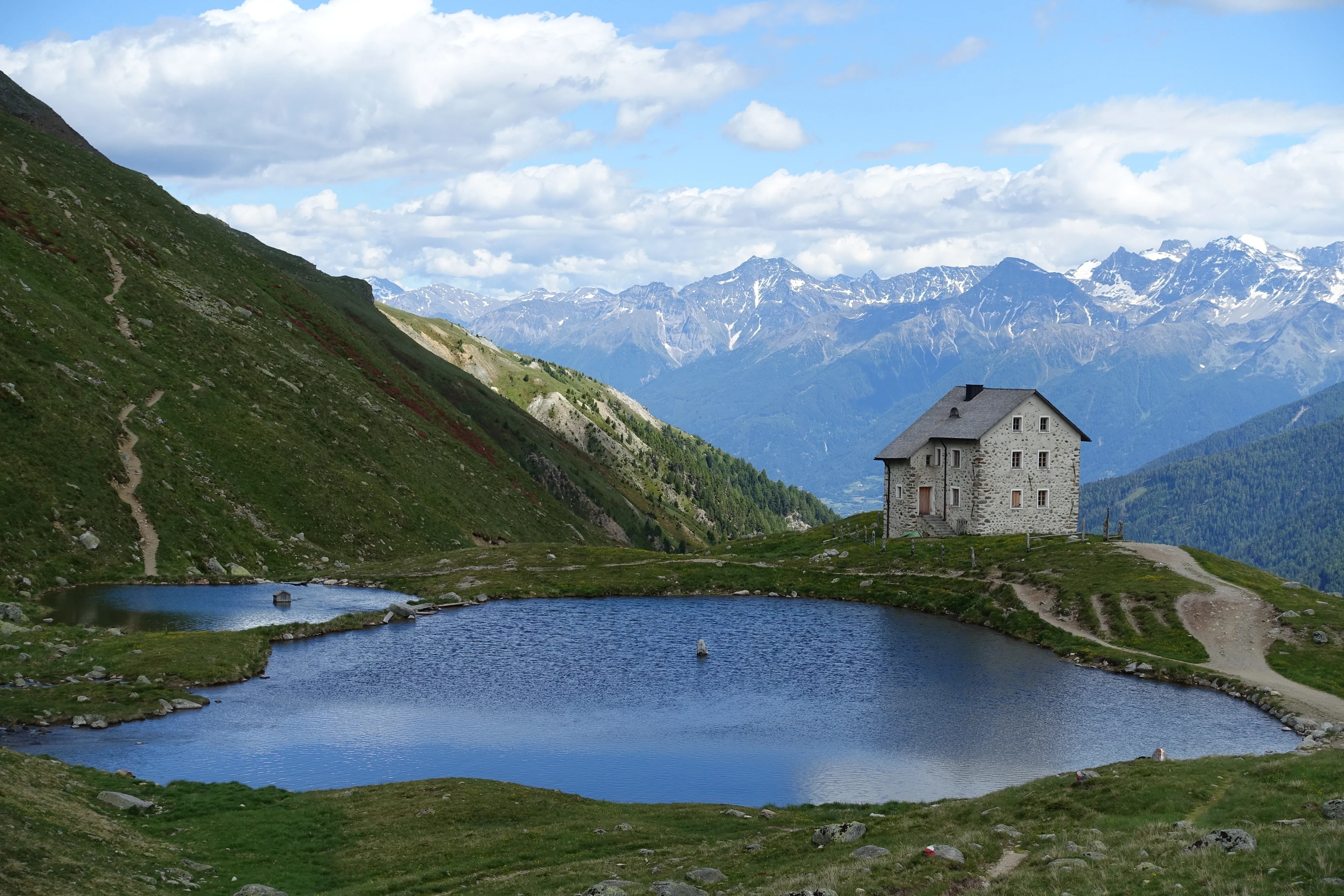 Small alpine water reservoir in Northern Italy