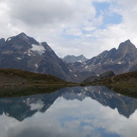 Piz Buin and Piz Fliana as viewed from Lai Blau in the Lower Engadin