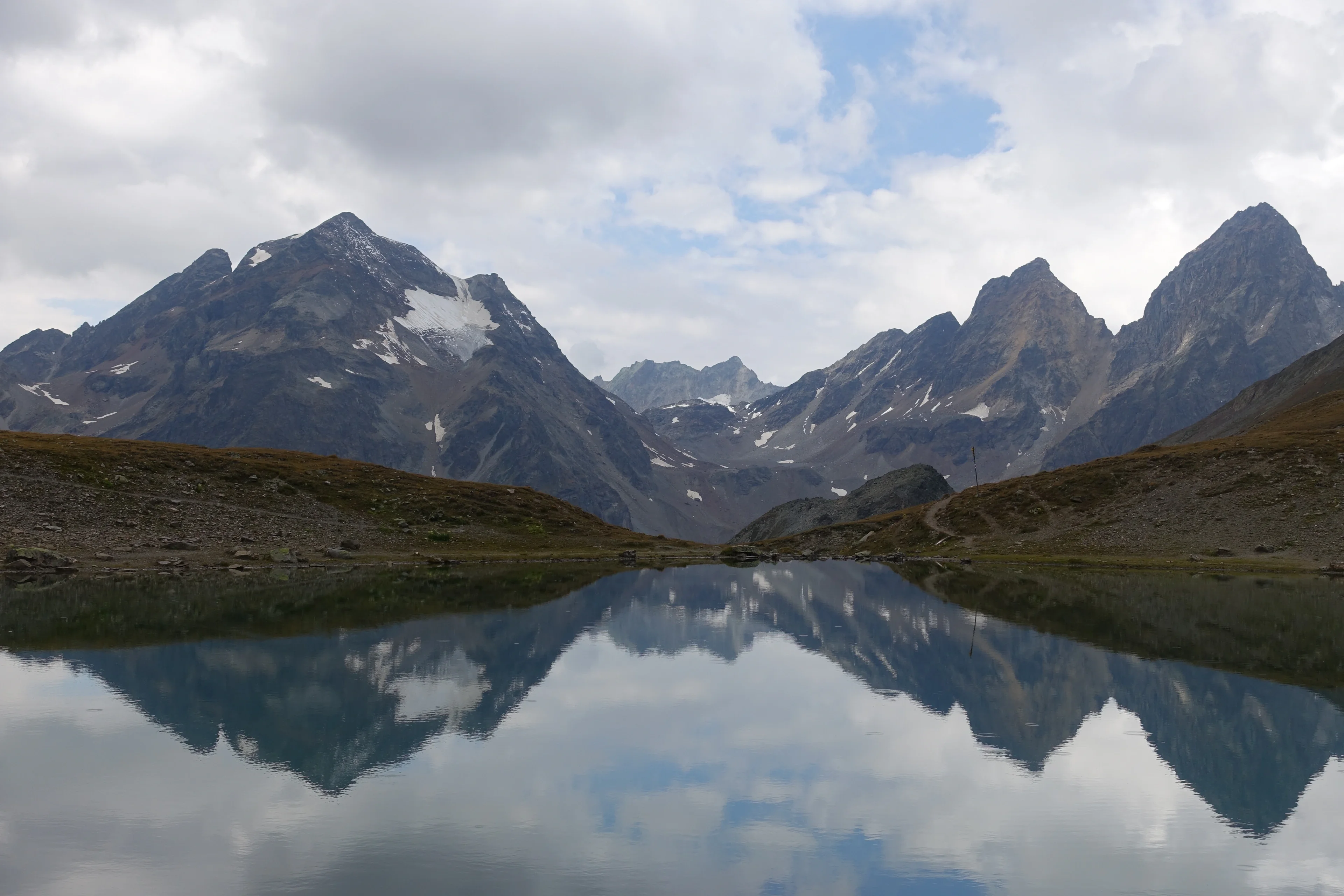 Piz Buin and Piz Fliana as viewed from Lai Blau in the Lower Engadin