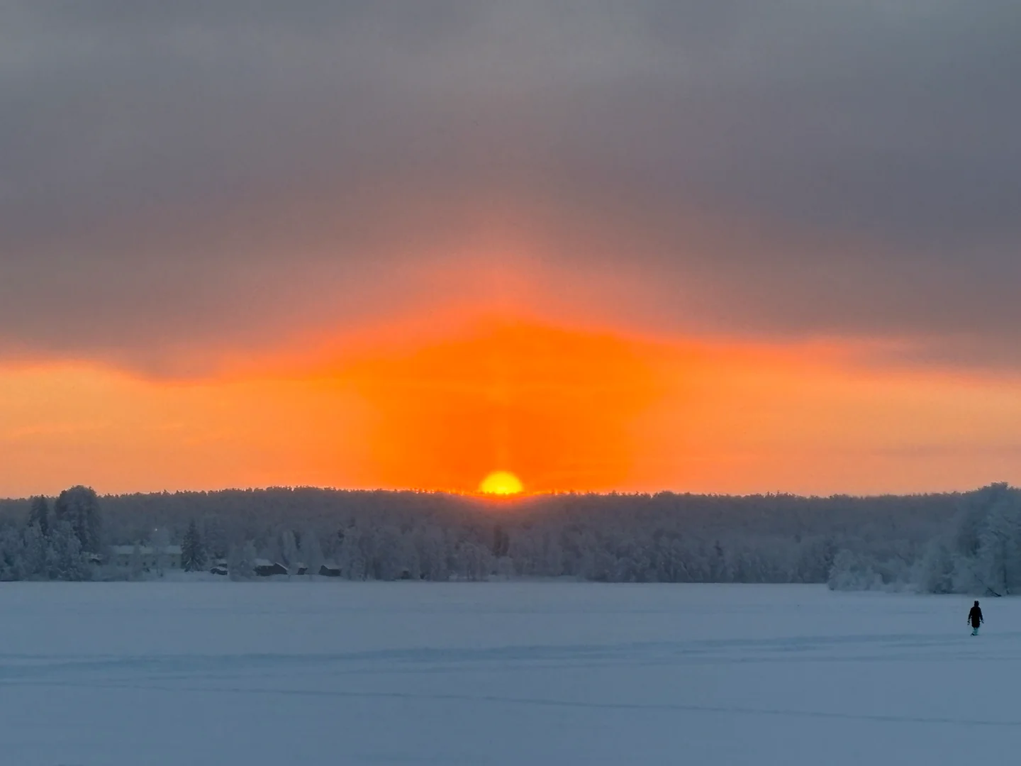 A man walking alone on the snow