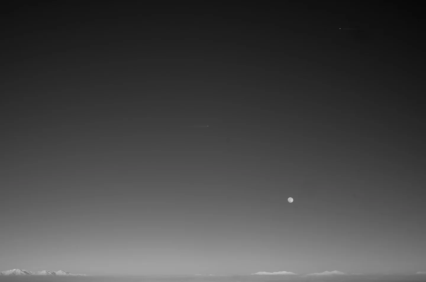Earth, moon, and sky