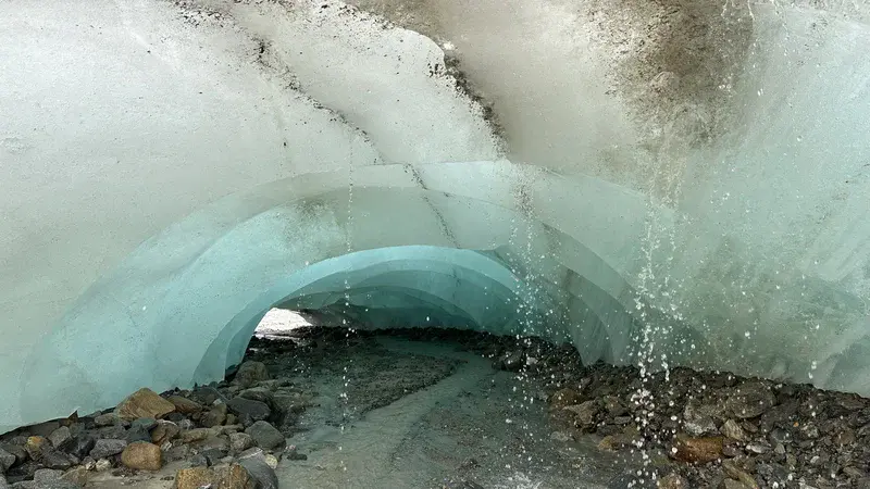 Ice tunnel in a melting glacier