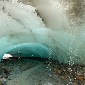 Ice tunnel in a melting glacier