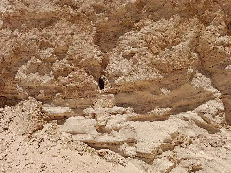 An Original Outcrop of Sedimentary Bedding with Weathering Gaps and Holes