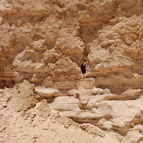 An Original Outcrop of Sedimentary Bedding with Weathering Gaps and Holes