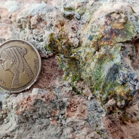 Epidote as a Semi-gemstone occurred within Lead/Zinc Ores and Iron Oxides Deposits