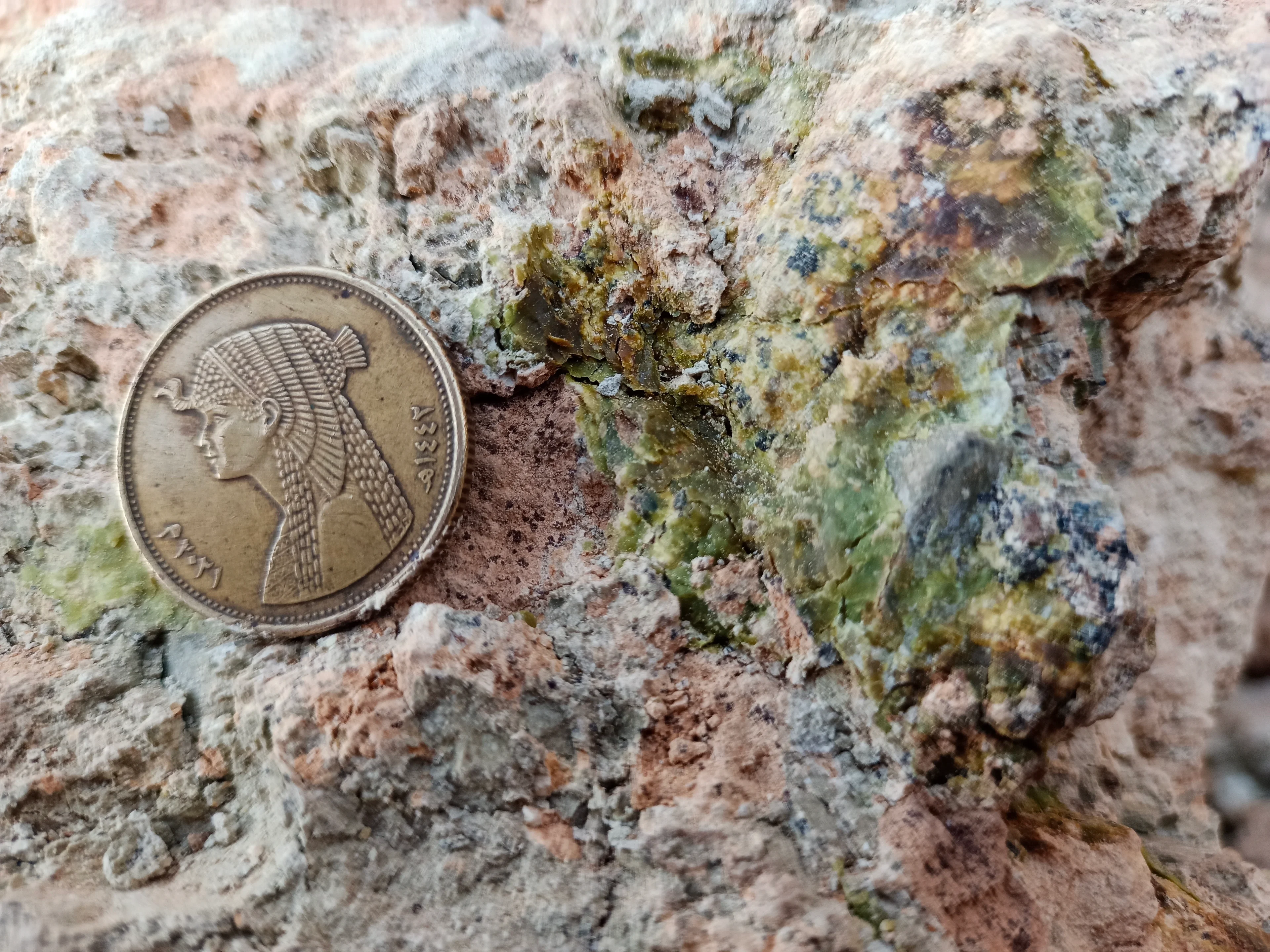 Epidote as a Semi-gemstone occurred within Lead/Zinc Ores and Iron Oxides Deposits