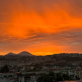 Solar Pyroclasm: When Vesuvius Borrows Fire from the Sky!
