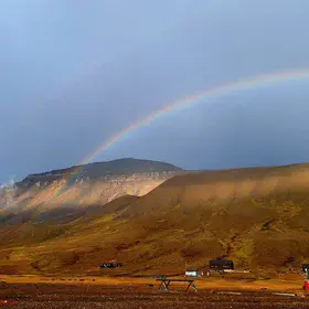Arctic Colors: Rainbow Over Svalbard