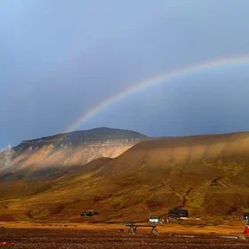 Arctic Colors: Rainbow Over Svalbard