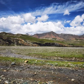 Modern floodplain with outcrops of Carboniferous coal beds in the Tuolai Mountain, Qinghai Province, NW China
