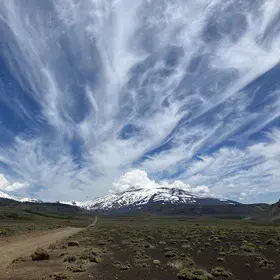 Whispy clouds above Antuco volcano (Chile)