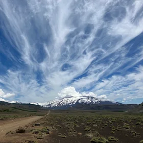 Whispy clouds above Antuco volcano (Chile)