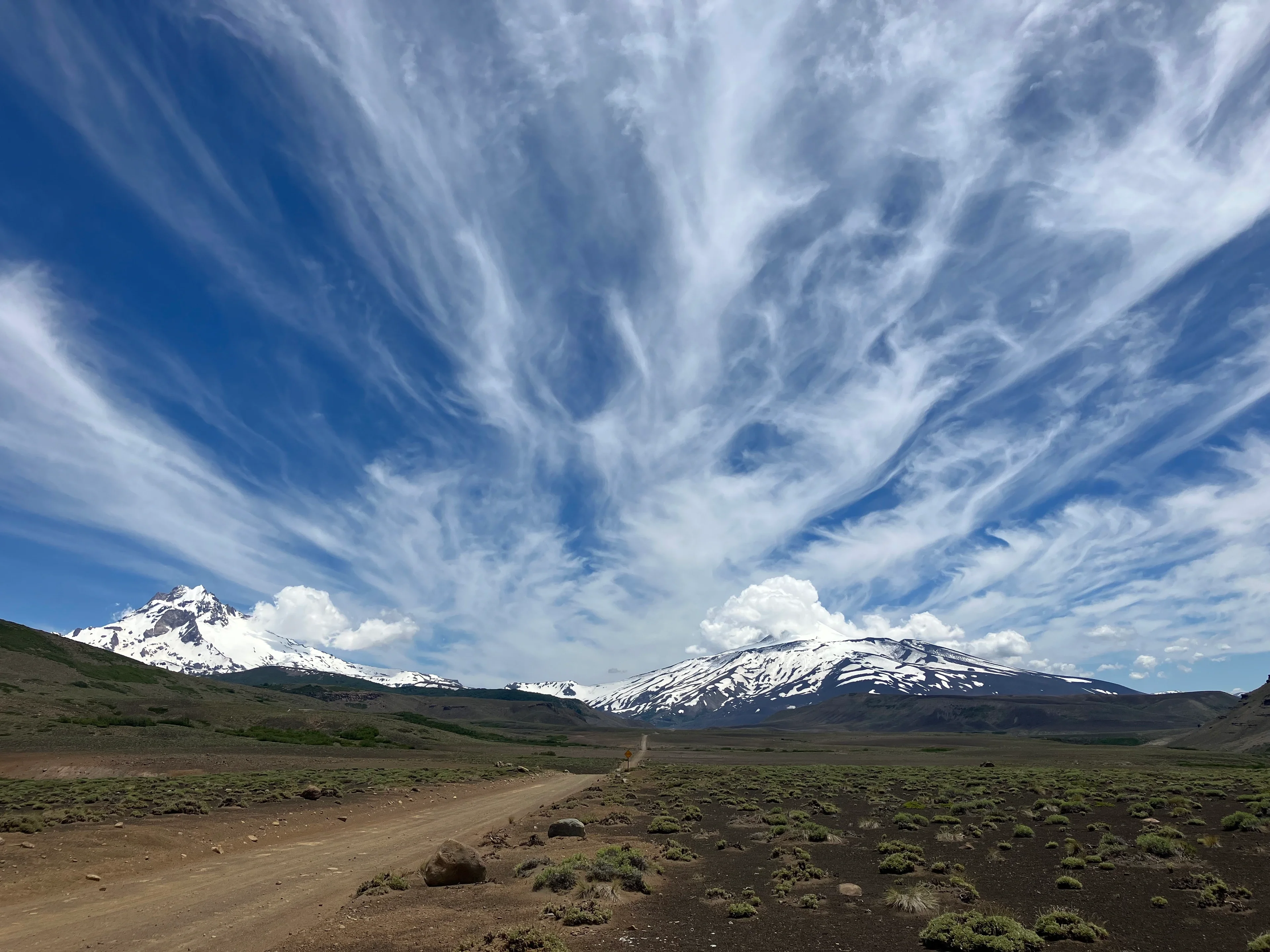Whispy clouds above Antuco volcano (Chile)