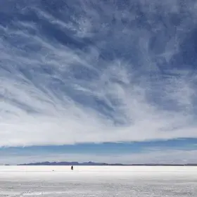 A Couple under the Clouds at Salar de Uyuni