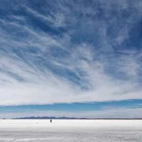 A Couple under the Clouds at Salar de Uyuni