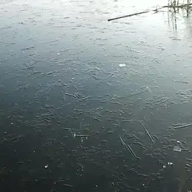 Icy lake and journey to sediment sampling  point