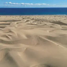 the Maspalomas Dunes, where sand meets the sea