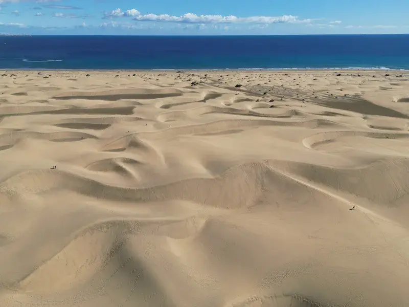the Maspalomas Dunes, where sand meets the sea