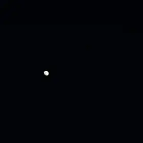 Gibbous moon in a dark sky