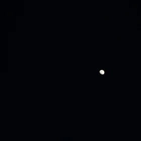 Gibbous moon in a dark sky