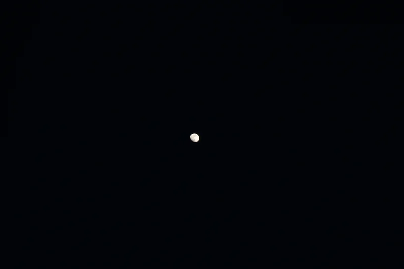Gibbous moon in a dark sky