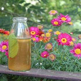 Homemade tee placed next to flowers