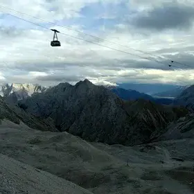 Timelapse video of layers of clouds passing over the Alpine range