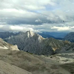 Timelapse video of layers of clouds passing over the Alpine range