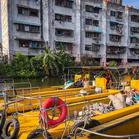 Harbour of Riverine Plastic Clean-up Boats on the Chao Phraya River, Bangkok, Thailand