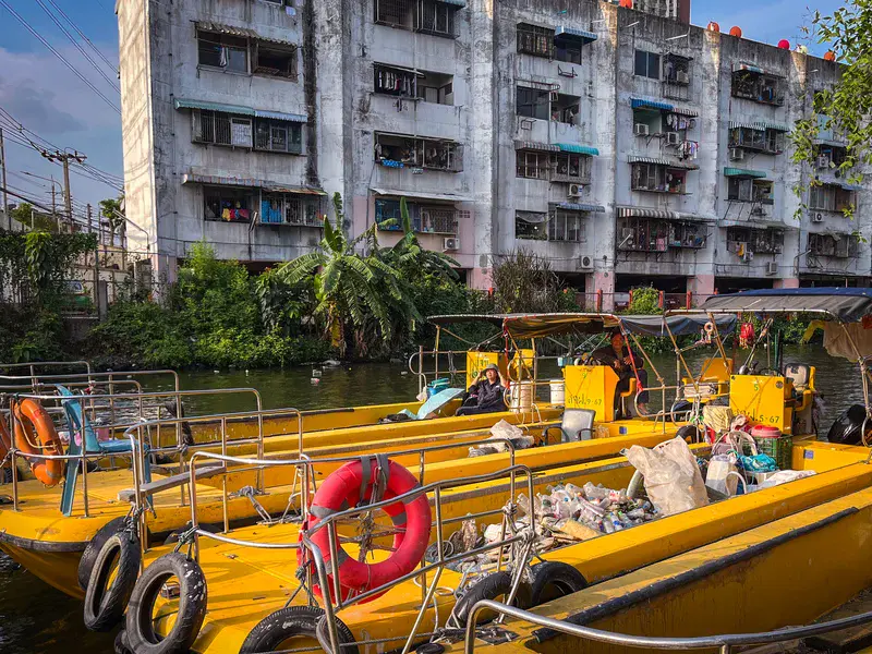 Harbour of Riverine Plastic Clean-up Boats on the Chao Phraya River, Bangkok, Thailand