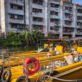 Harbour of Riverine Plastic Clean-up Boats on the Chao Phraya River, Bangkok, Thailand
