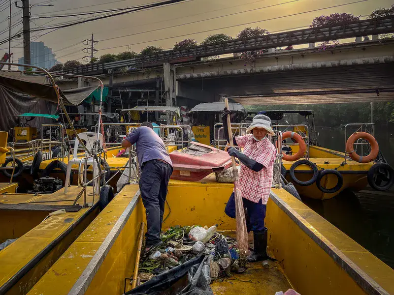 Lady preparing for River Clean-up on the Chao Phraya River, Bangkok