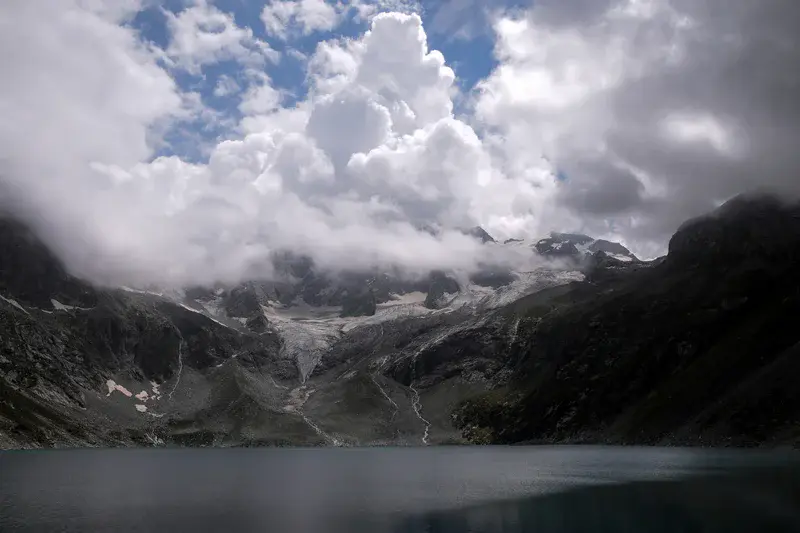 Katora Lake under Rising Clouds and Melting Ice