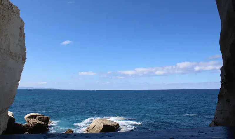 Where Waves Carve the Mountain