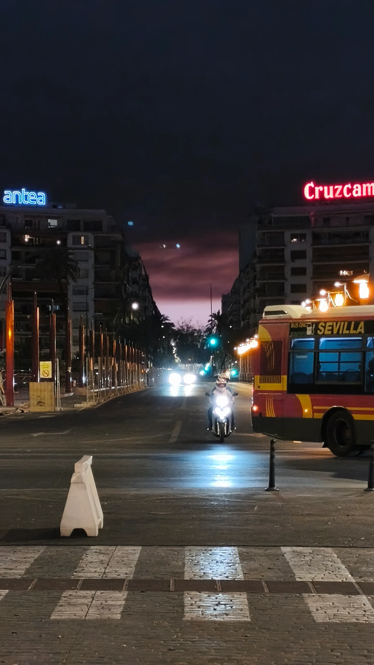Sunset over Seville with pink, violet and reddish tones caused by smoke from the Niebla wildfire, about 60 km away.